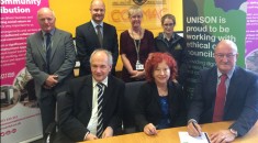 UNISON and Cormac representatives with signed charter