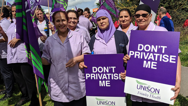 Frimley health branch members on a protest with UNISON placards and flags