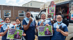 domestic services staff at Luton and Dunstable Hospital enjoy ice creams and hold 'all eyes on Boris' placards