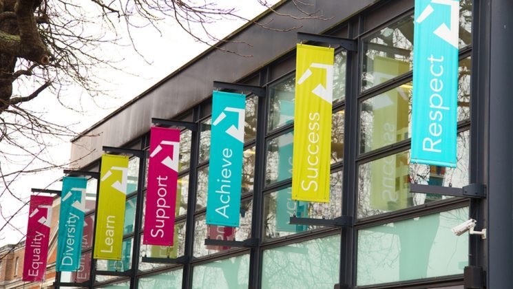 Further education college windows with banners