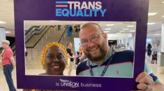 Two UNISON members stand inside a frame saying 'Trans equality is a UNISON business'