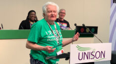 Jackie Lewis at the rostrum, accepting her lifetime achievement award at UNISON's LGBT+ 2022 conference