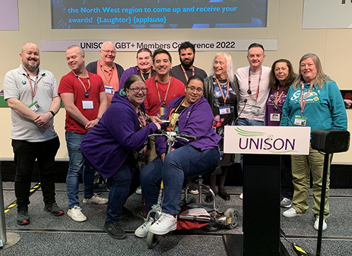 Northern Ireland delegation receiving their award for best photograph from UNISON vice president Amerit Rait at the union's LGBT+ conference in Edinburgh