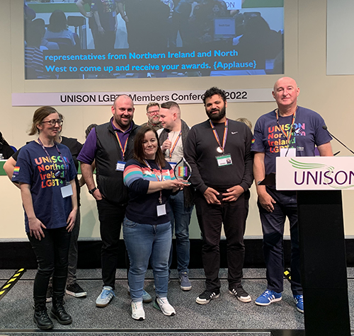 Northern Ireland delegation receiving their award for recruitment and organising from UNISON vice president Amerit Rait at the union's LGBT+ conference in Edinburgh