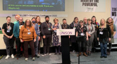 The trans caucus receiving it's award for caucus of the year from vice president Amerit Rait at UNISON's LGBT+ conference in Edinburgh