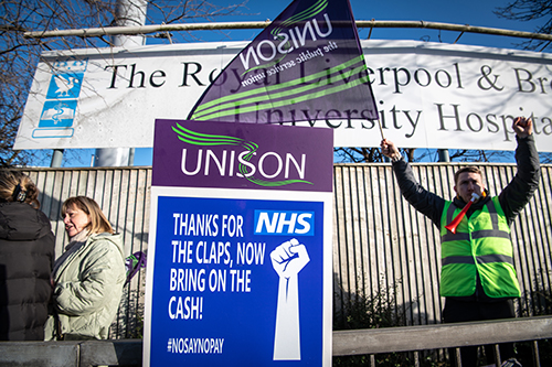 Striking health workers outside The Liverpool Heart and Chest Hospital, Liverpool, UK.