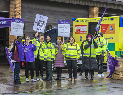 Pickets with an ambulance
