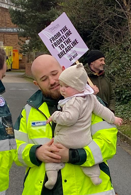 North West ambulance picket with small baby