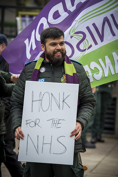 Waterloo picket with 'honk for the NHS' handwritten placard