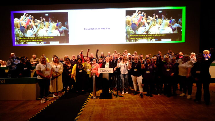 Representatives of striking health branches receiving an ovation from UNISON's annual health conference in Bournemouth