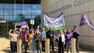 SWs and OTs working at South Gloucestershire council on the picket line outside their council building