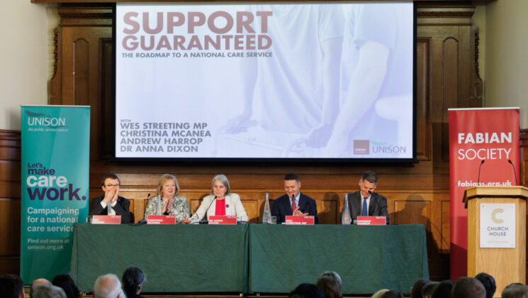 Launch event of the Fabian report 'Support Guarenteed' showing a top table with 5 speakers. Ben Cooper, Christina McAnea, Dr Anna Dixon, West Streeting MP and Andrew Harrop. Seated in front of Fabians graphics.