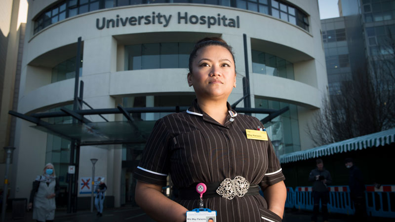 May Parsons stood in front of 'University Hospital'