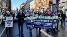 Christina McAnea at the front of a march in Belfast, on a day of strike action. She and others are holding a banner calling for fair pay for public service workers in Northern Ireland