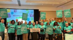 Community members stage a photo op in support of a national care service at UNISON's national community seminar and conference 2024