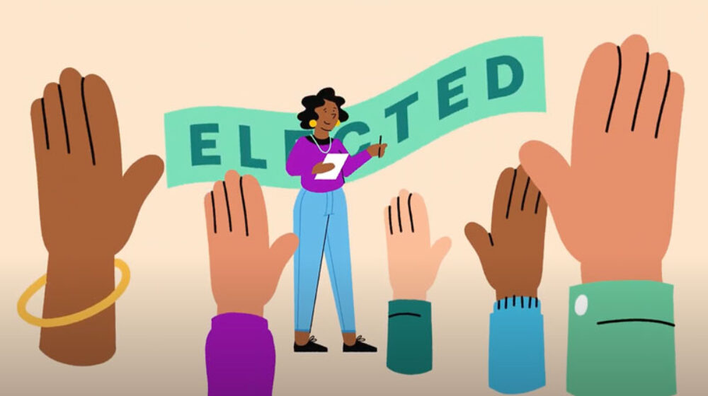Graphic of hands raised and woman in the centre with 'elected' banner